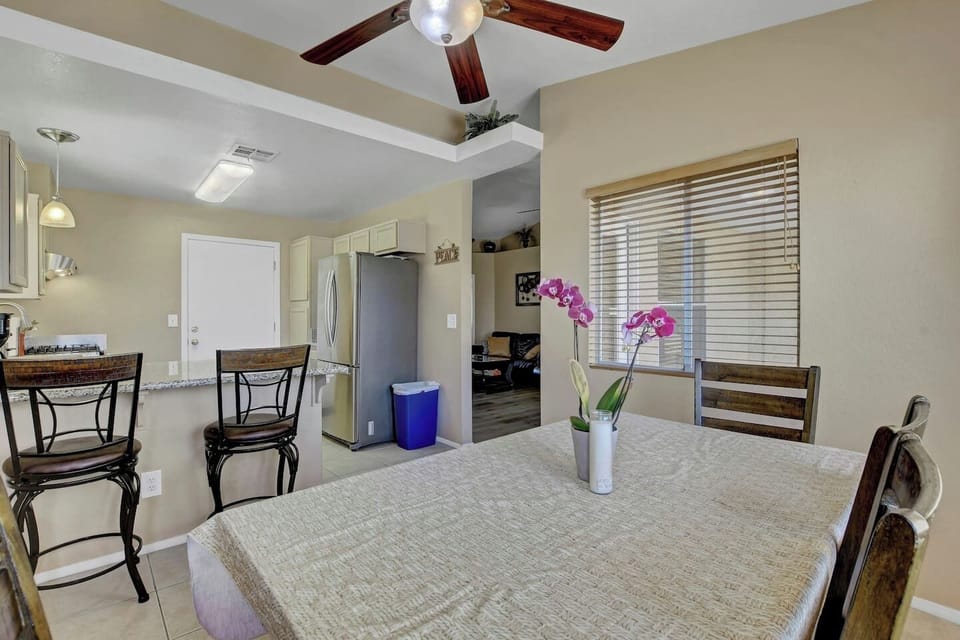 Spacious dining area with comfortable seating for guests in quiet Las Vegas vacation rental.l