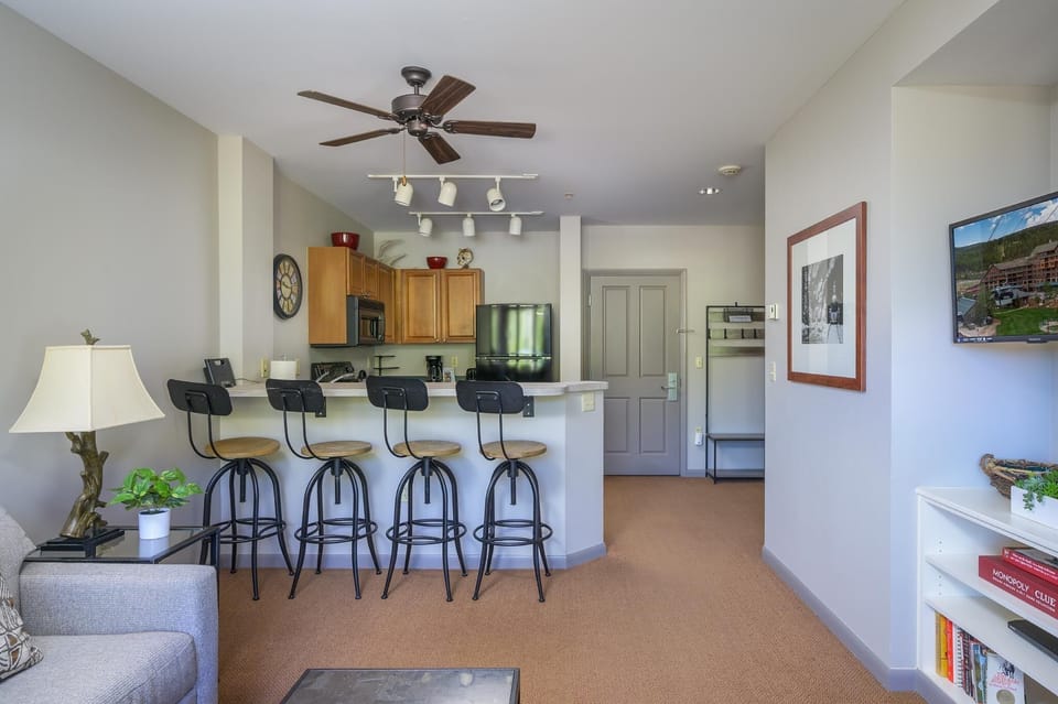 Open layout flows from the living area into the kitchen