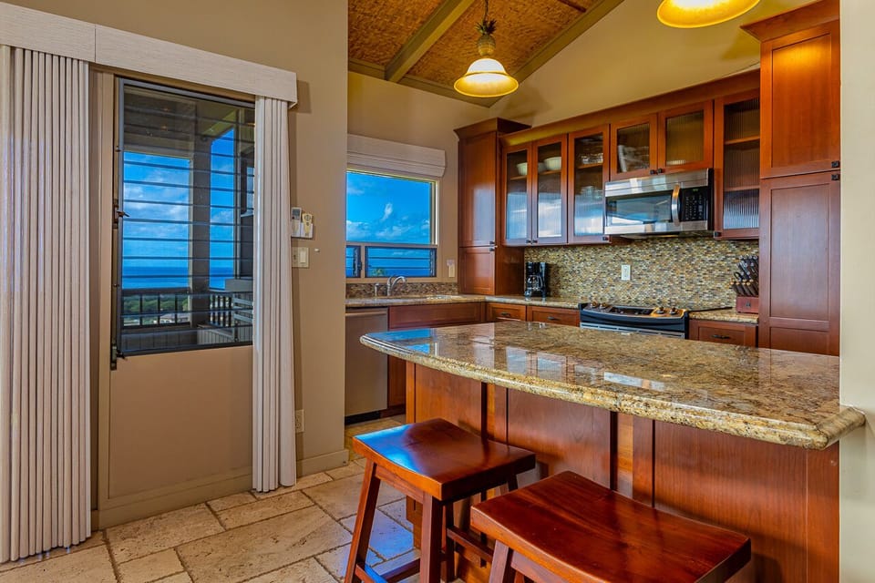 Seating for two at the breakfast bar. 