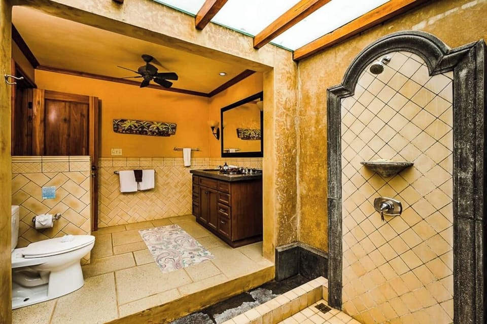 The second bathroom features a modern design with full amenities, providing comfort and convenience during your stay in Langosta, Costa Rica.