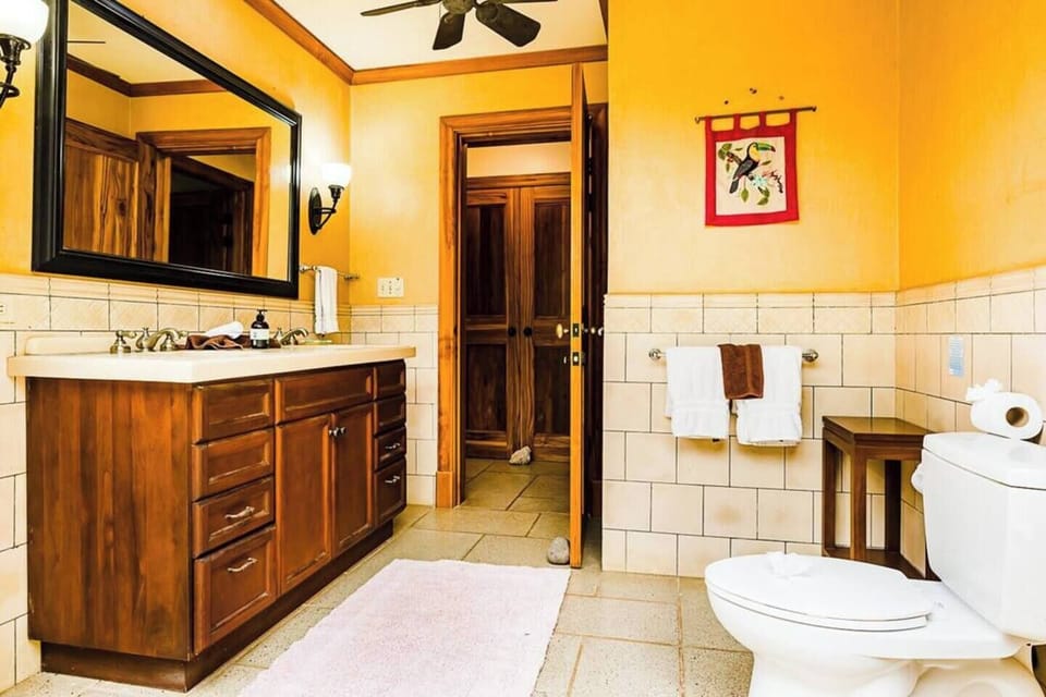 Enjoy the sleek and functional second bathroom, perfect for relaxing after a day at the beach or exploring Tamarindo’s surroundings.