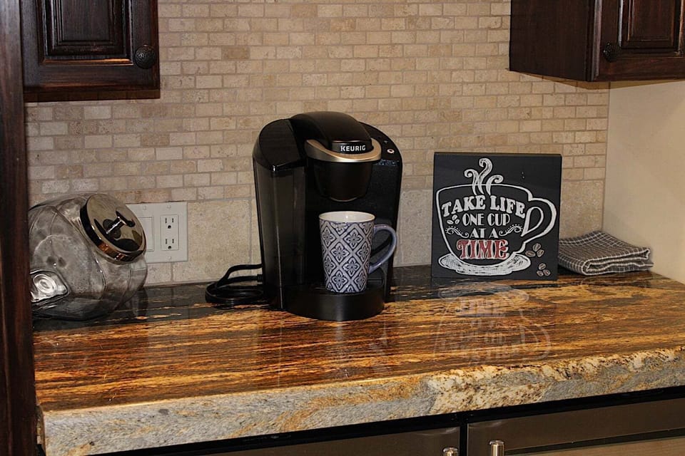 Grab yourself a nice cuppa at this coffee nook, or reach below into the wine fridge to grab a good time!