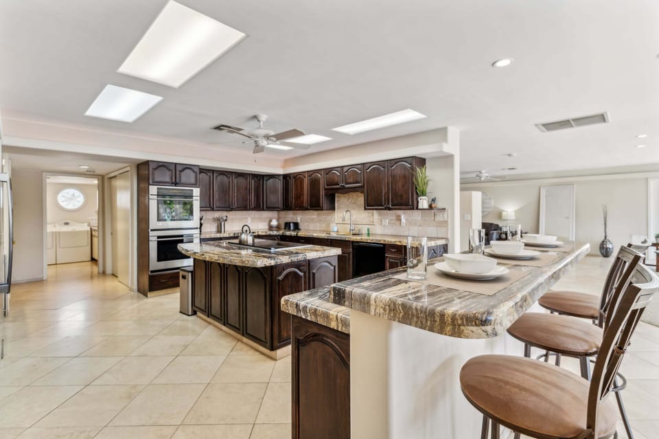 Stunning Chef's Kitchen with countertop bar seating