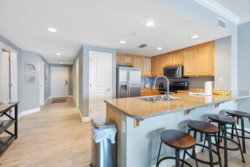 Additional seating at the open kitchen eat-in bar
