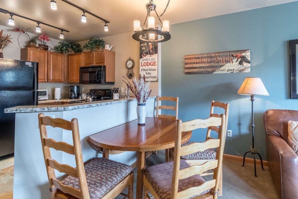 Dining table pulls out to seat four