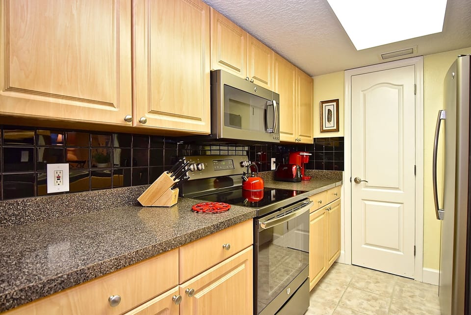 Lots of counter space, cupboards, and a pantry.