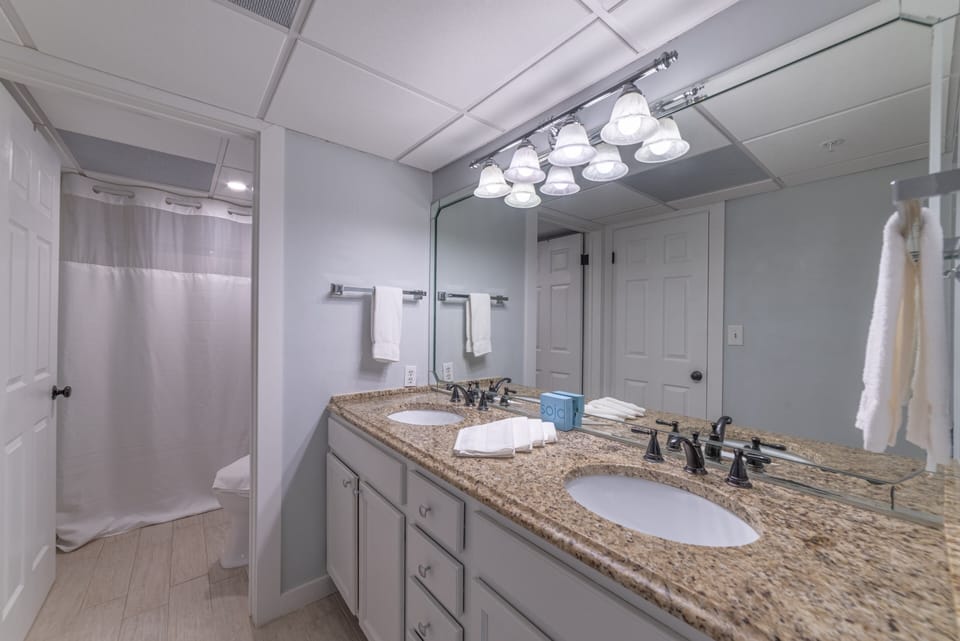 Double vanities and a large soaking tub