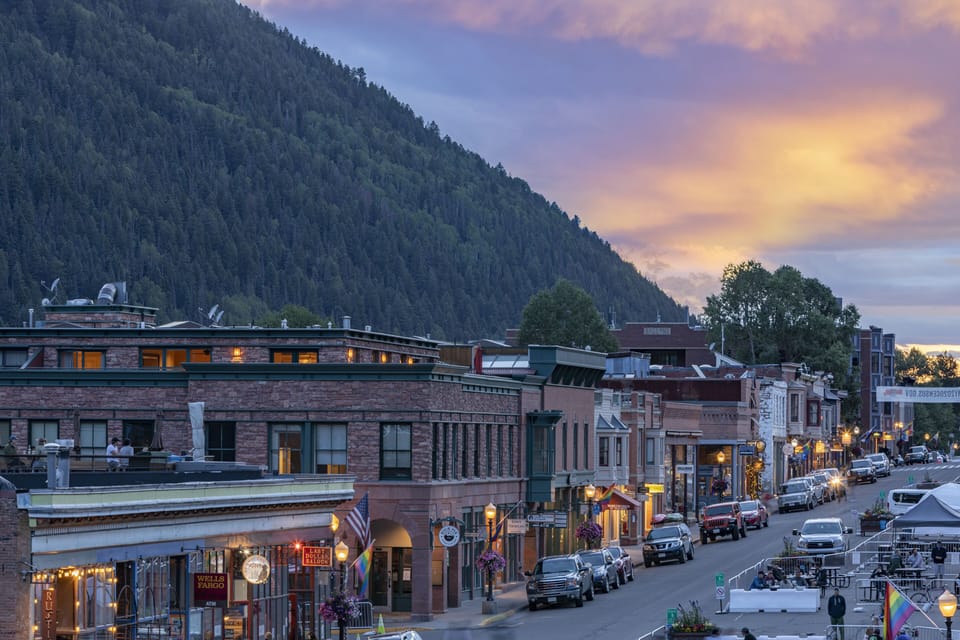 The Rooftop is in the heart of Telluride and perfectly perched on the top of the Wintercrown building. This is the building with red stone and green trim.