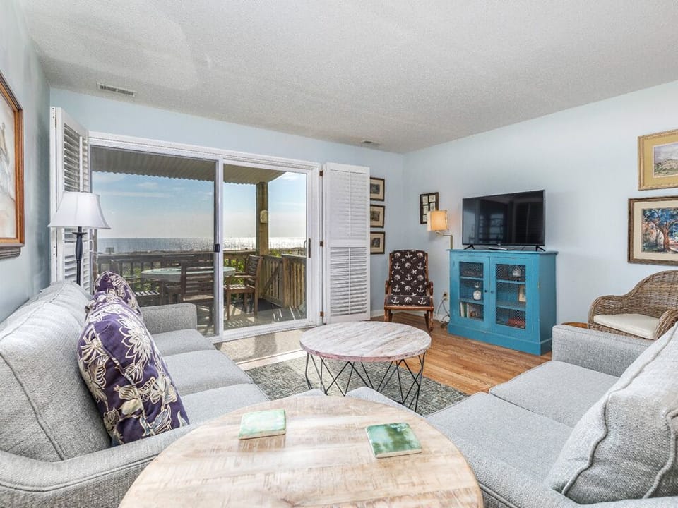 Living and Dining Areas open to Balcony over the Sand