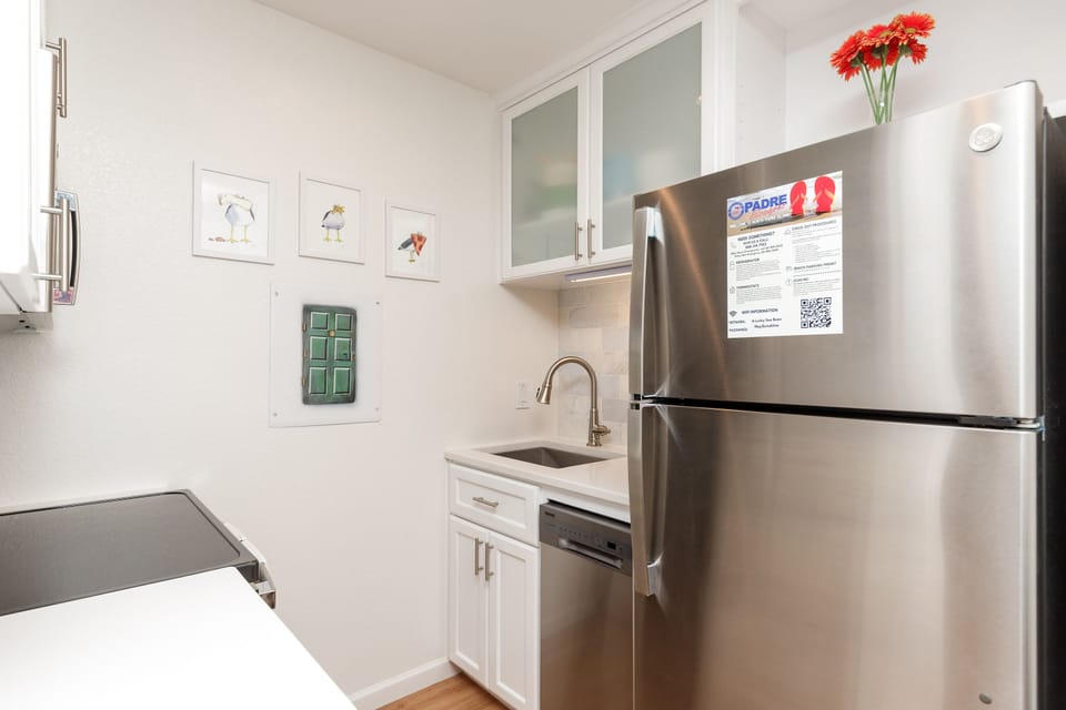 Your modern kitchen features stainless steel appliances and sleek countertops, perfect for preparing meals during your stay.