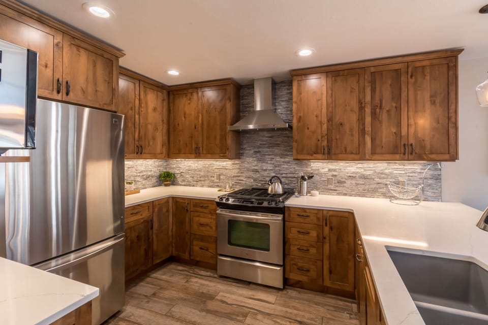 New stainless steel appliances and granite counter tops