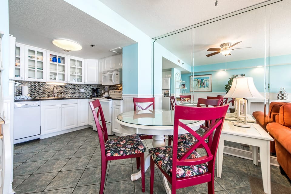 Dining seats open to the kitchen and living areas