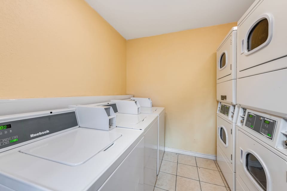 Keep your clothes fresh in this spacious laundry facility with multiple machines, making longer stays comfortable and convenient for you.