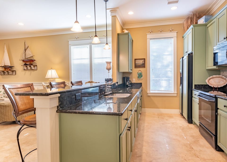 Well stocked Kitchen, granite countertops and stainless applianc