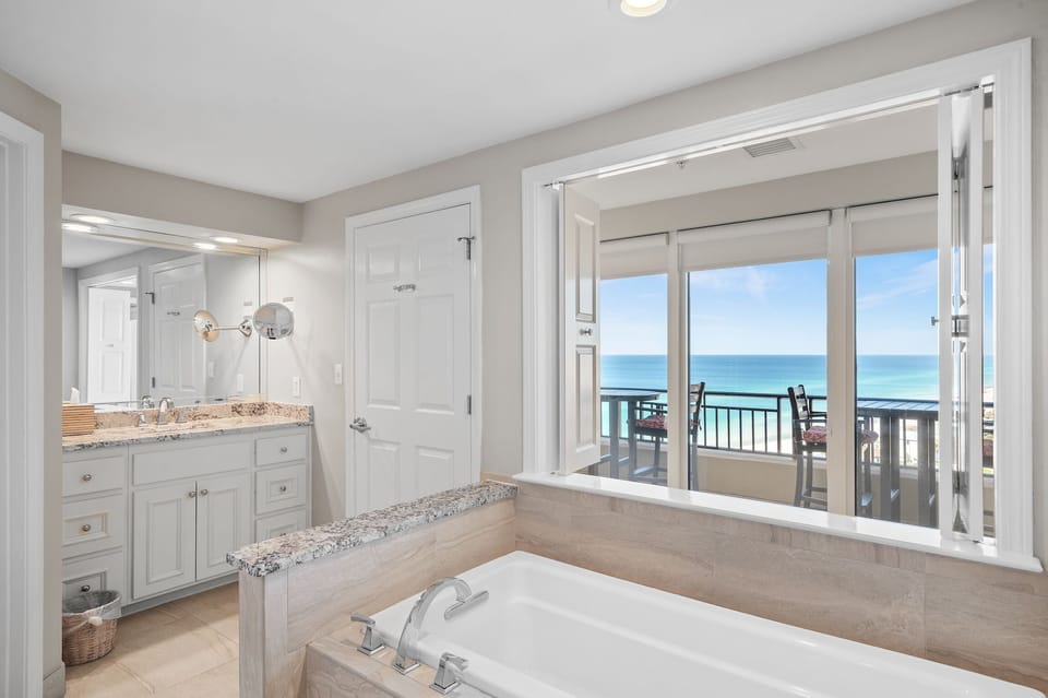 Master Bathroom First Vanity & Soaking Tub with Beach View