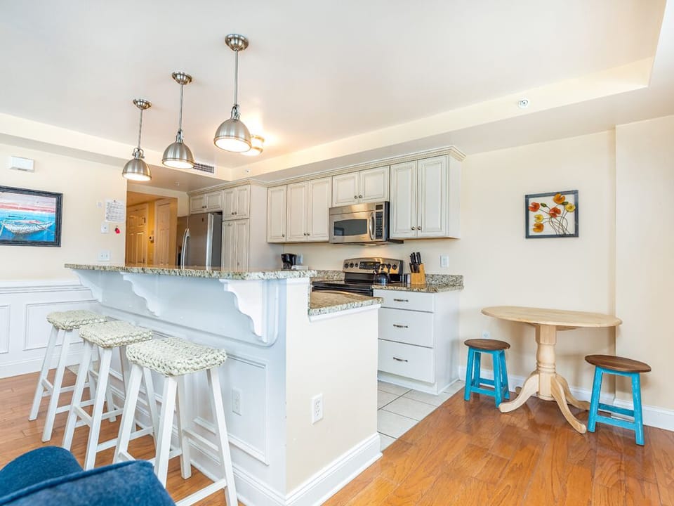 Kitchen with counter seating  for 3