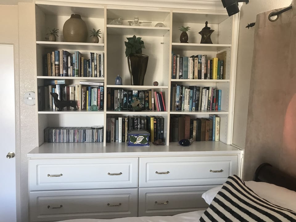 Many books, knick knacks, movie dvd's, etc.