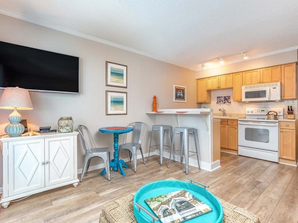 Living area offers table seating for 2