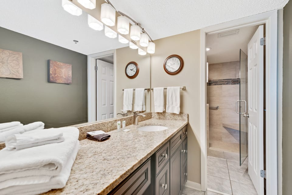 Private Master Bath with Granite Counter Top, Extended Vanity and beautifully Tiled Shower.