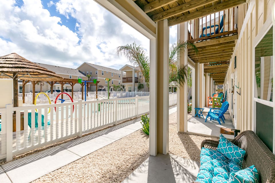 Your private patio overlooks the colorful playground, where little ones can play safely while you relax in comfort.