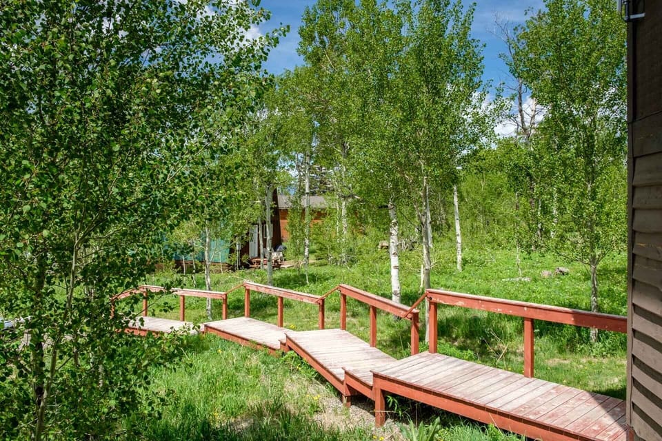 The home sits on one half acre and enjoys incredible views of Lionhead Mountain and other peaks along the Continental Divide.