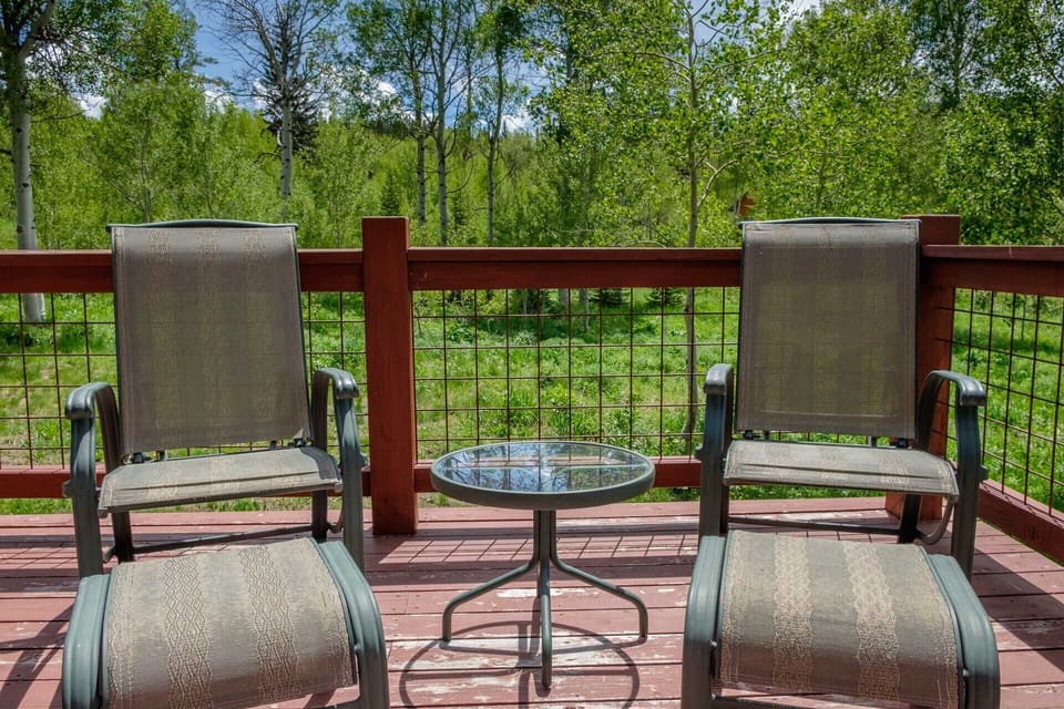 Decks on three sides of the house provide room for enjoying coffee in the morning sunshine and then sunset over the mountains.