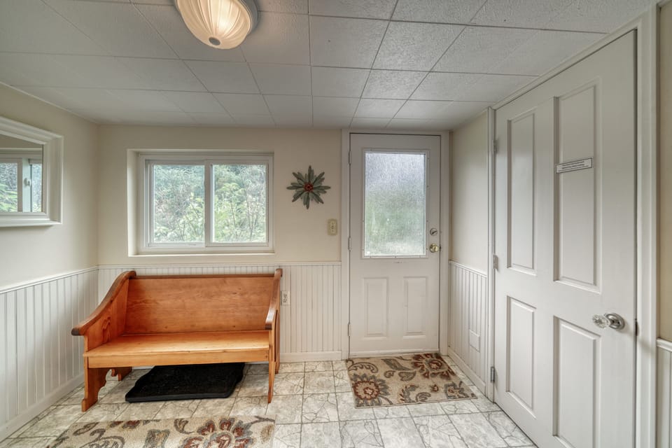 Back entry leads to a private backyard