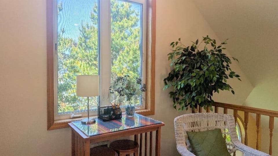 bar height table with 2 stools in loft