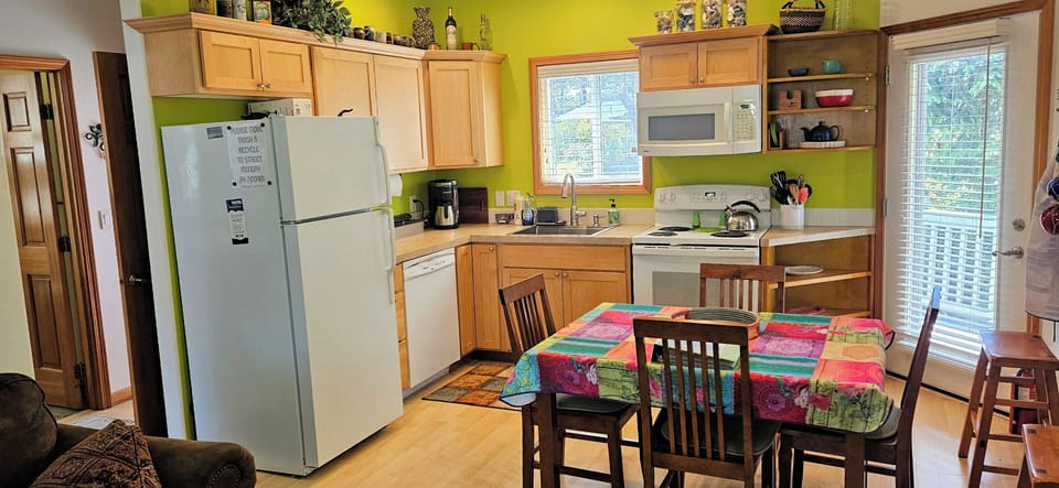 Kitchen with Dishwasher, Keurig Dual Brew Coffee maker & Electric Range