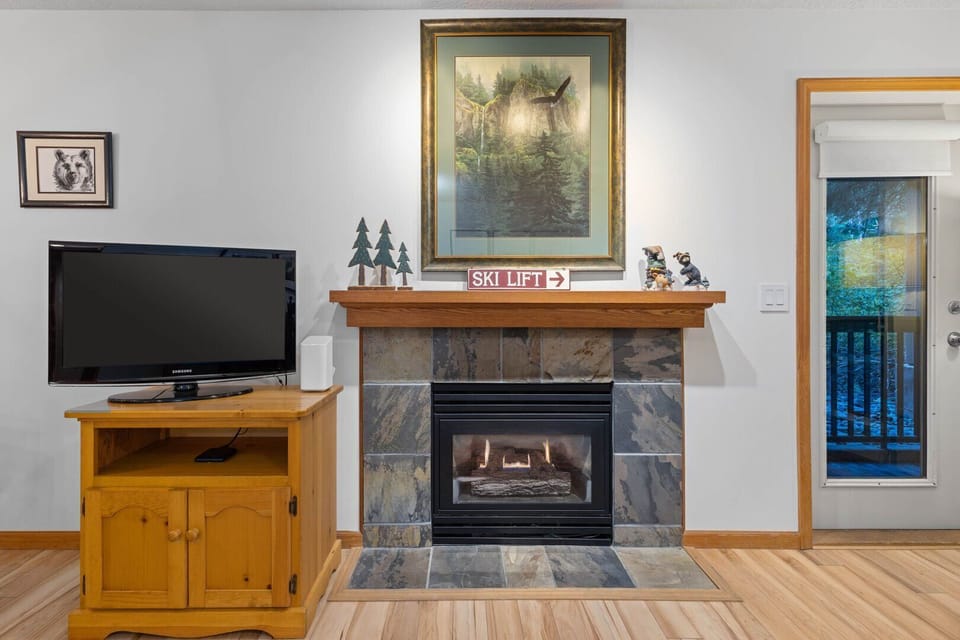 Kick back on the sofa or enjoy a movie night by the fireplace.