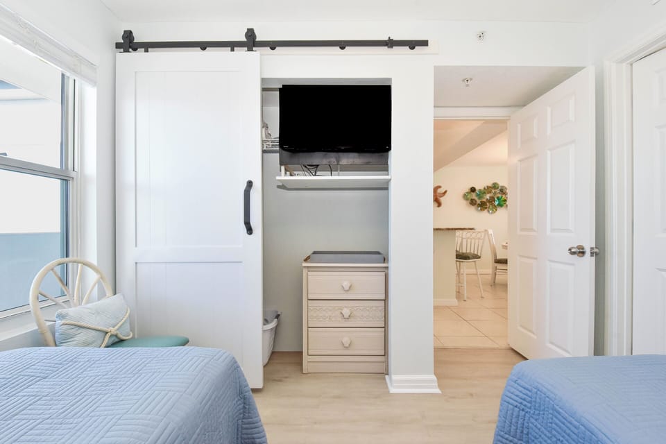Pelican Beach Resort 2016- Guest Bedroom with TV