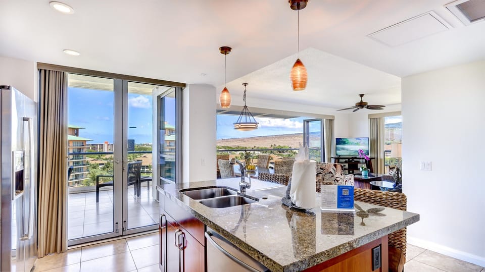 Make a delicious meal in this spacious kitchen looking out to the tropical views.