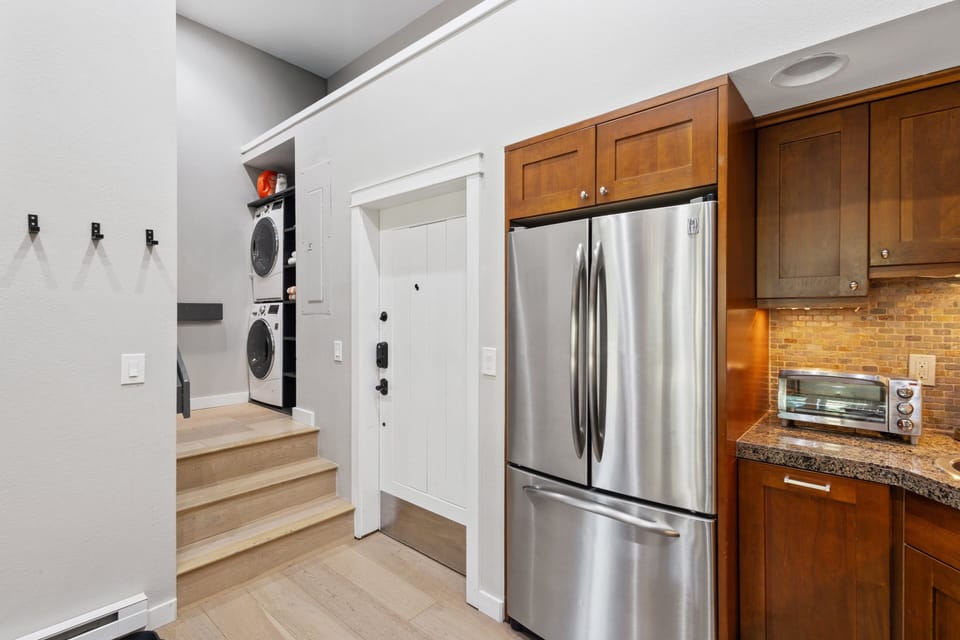 The entryway of Columbia 8. Ski storage is a locker in the interior hallway of the building.