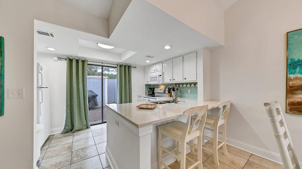 Kitchen Area With Access To Patio Grill