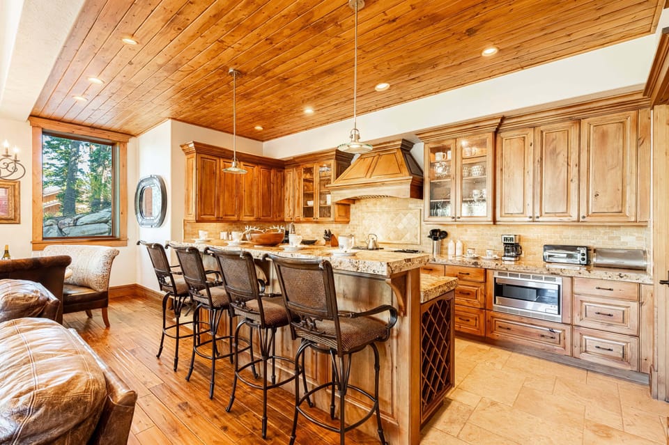 Chef's kitchen with bar seating for 4