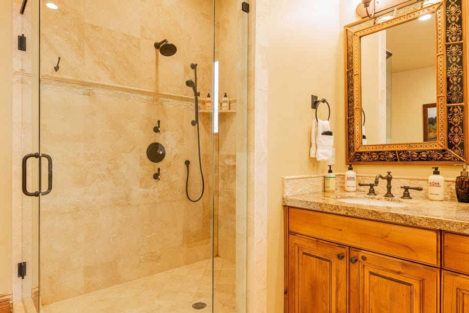 Large glass walk-in dual head shower