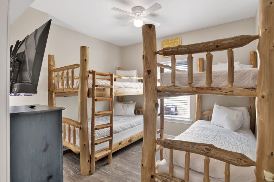 Bedroom 5 has a TV and two Twin over Twin bunk beds - sleeps 4