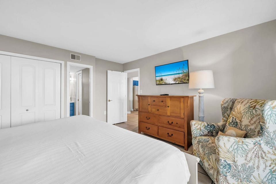TV and Access To Bathroom in Bedroom