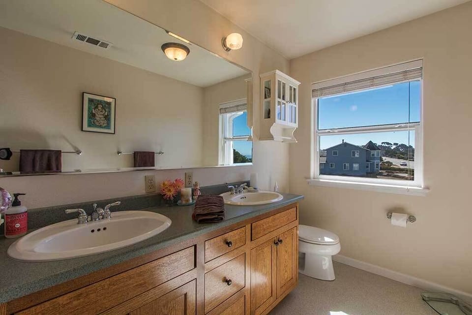 The 2nd bathroom is spacious and has double sinks.