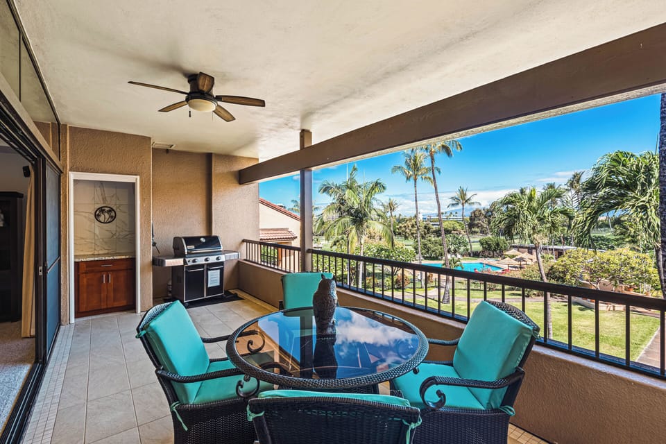 Spacious lanai with room for dining, grilling, and lounging