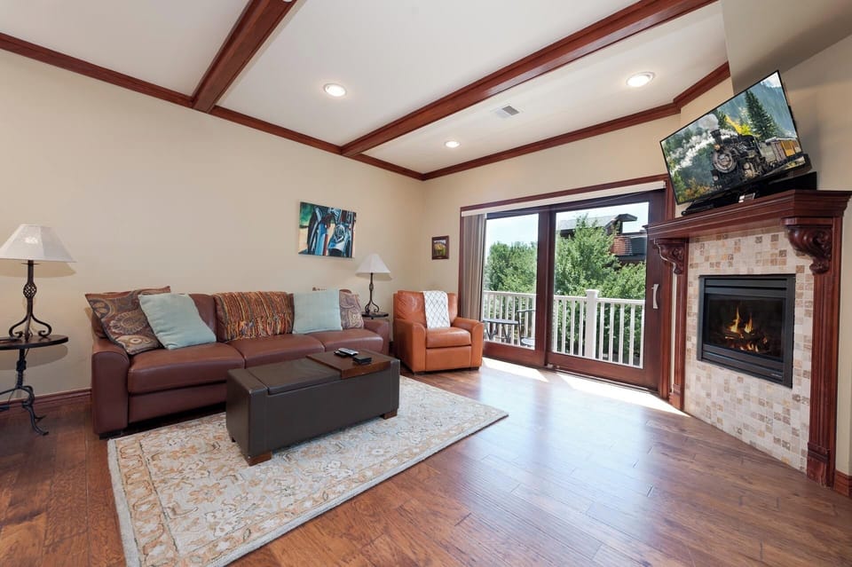 Main Living Space - TV, Gas fireplace and Deck