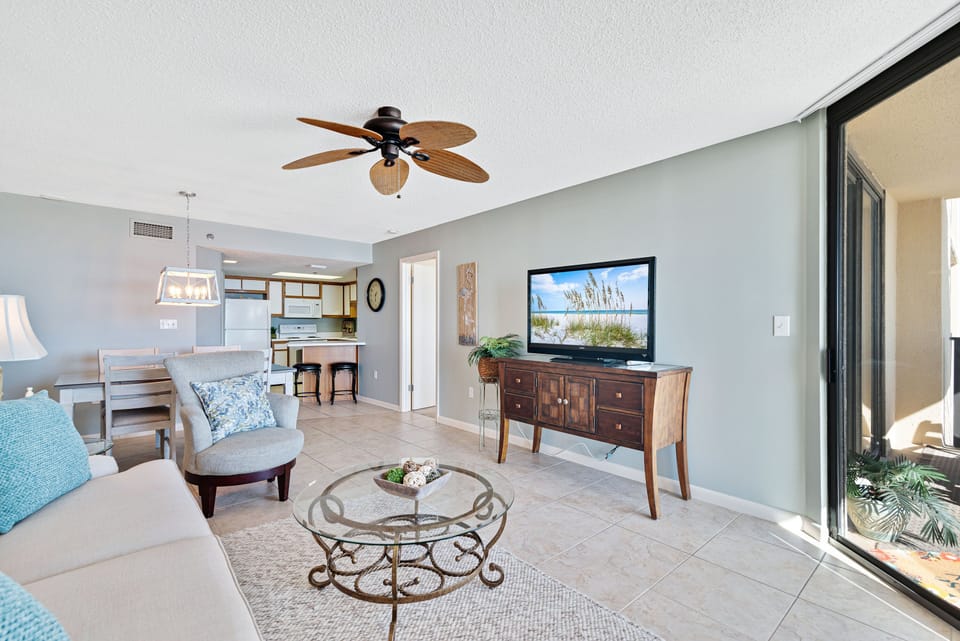 Living Area with a Sleeper Sofa and access to private balcony overlooking the Gulf