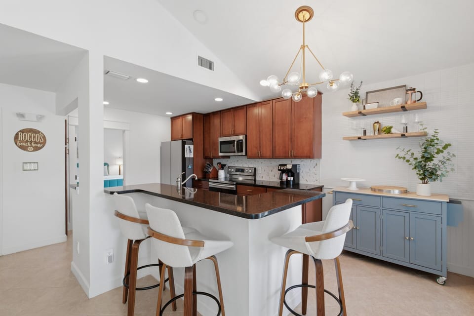 Kitchen With Seating For Three at Bar