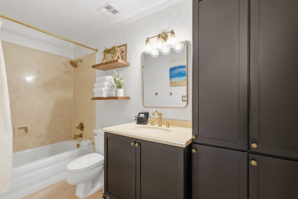 Guest Bathroom in Hallway Next to Second Bedroom