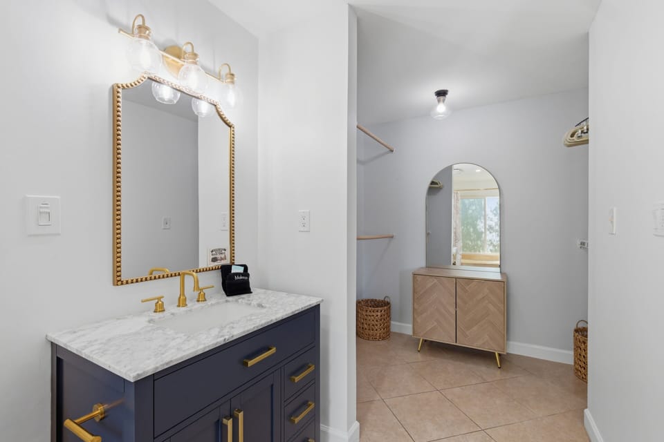 Walk in Closet Located Off Master Bathroom