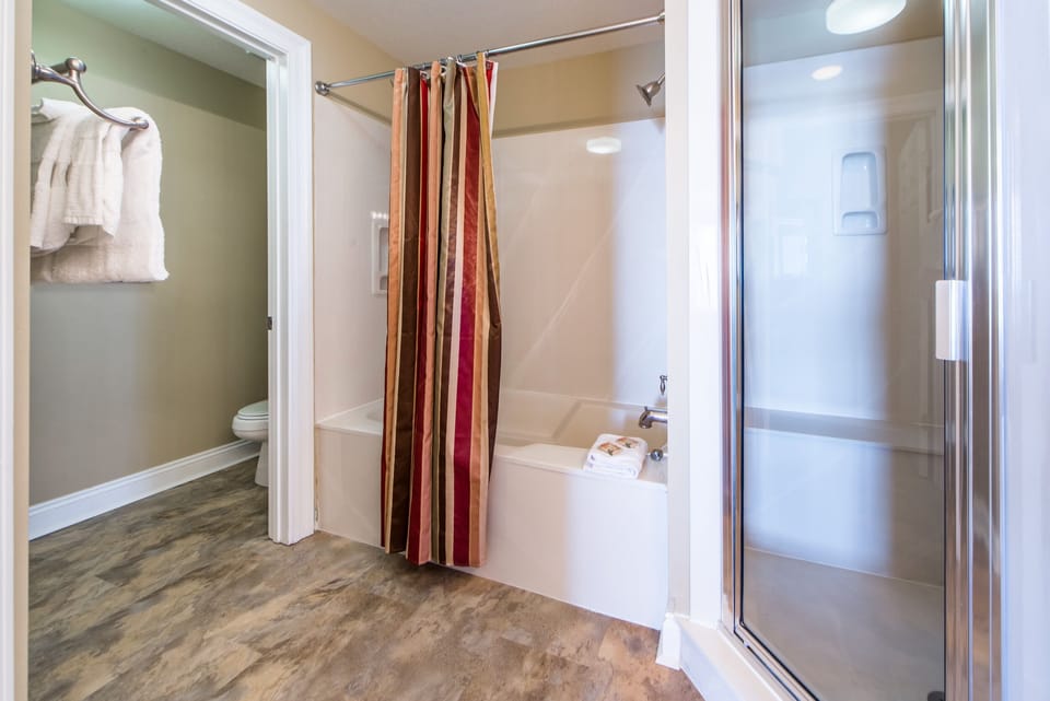 Large bath w/tub shower combo and walk in shower