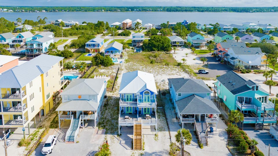 Located on the desired West Beach Blvd, just steps to the beach!