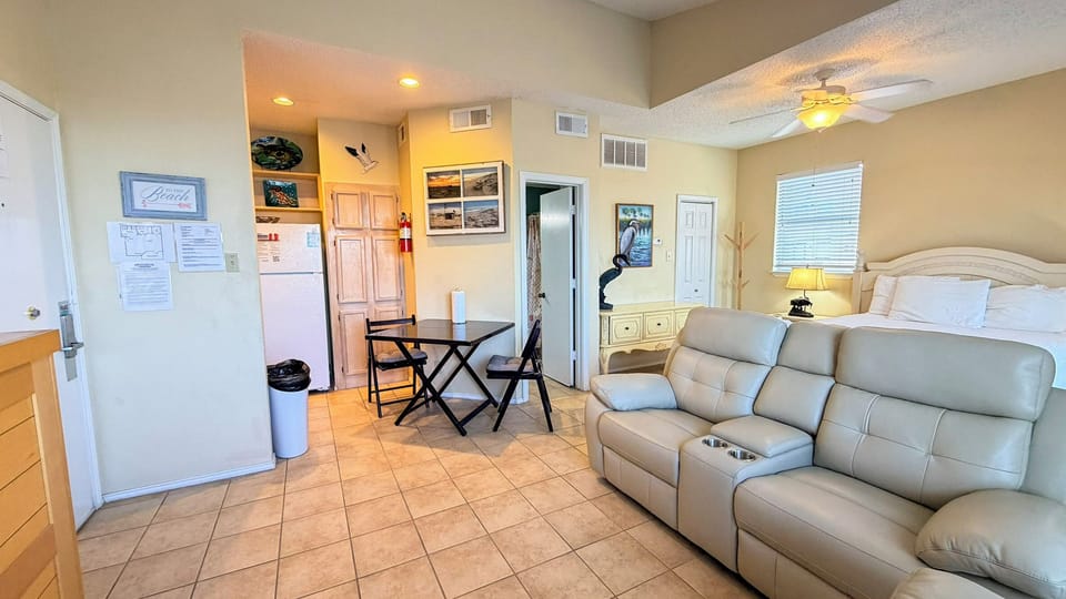 Unwind in your comfortable living space with plush seating, dining area, and thoughtful touches that make this feel like home.