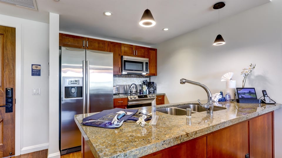 Featuring a full kitchen stocked with the essential items