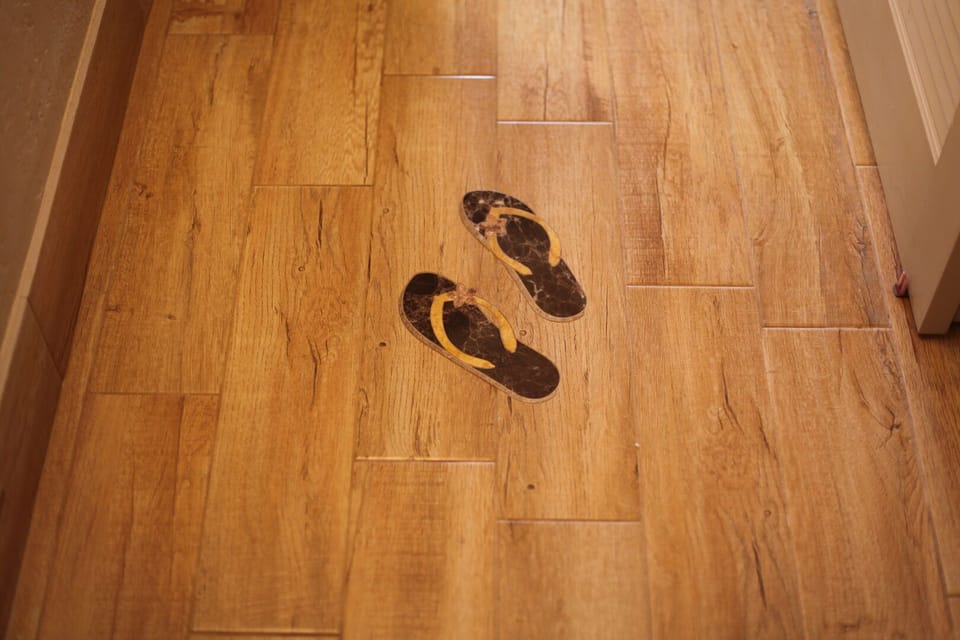 Gorgeous new flooring with custom Aloha inspired tile